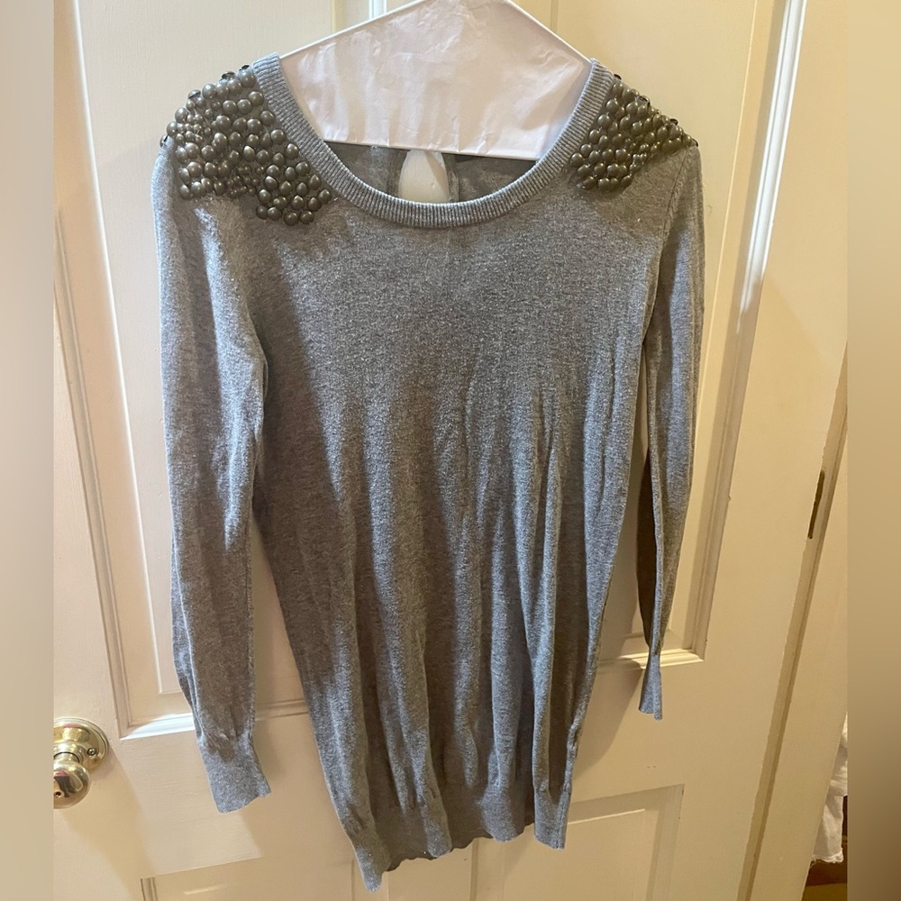 Theme sweater with embellishments